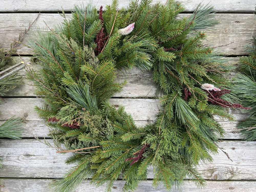 Handmade wreaths with fresh foliage
